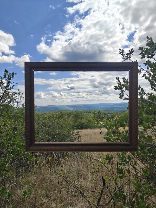 A landscape photographed through an empty frame